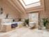 Badezimmer mit Travertinfliese Rustic als Boden- und Wandverkleidung